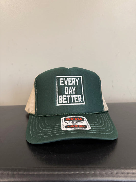 UH -.DARK GREEN/ KHAKI BOX LOGO TRUCKER HAT